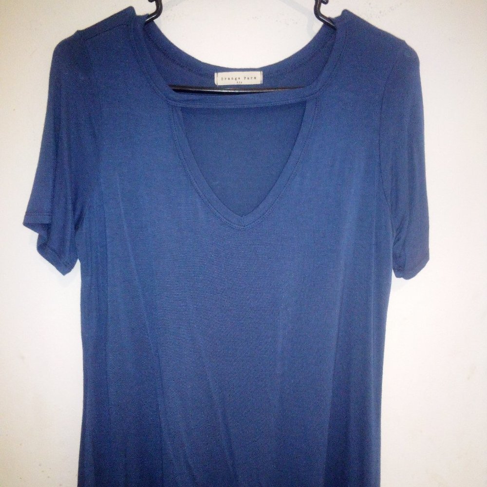 Blue shirt with triangle cut neckline